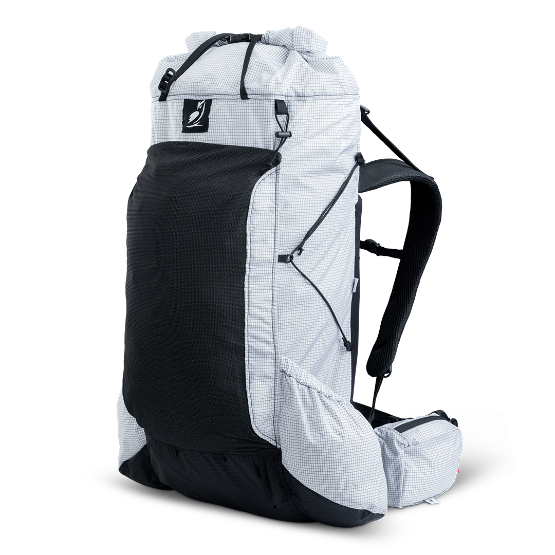 Angled front view of ultralight backpack highlighting front mesh pocket and compression system.