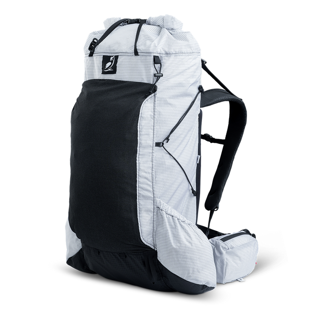 Angled front view of ultralight backpack highlighting front mesh pocket and compression system.