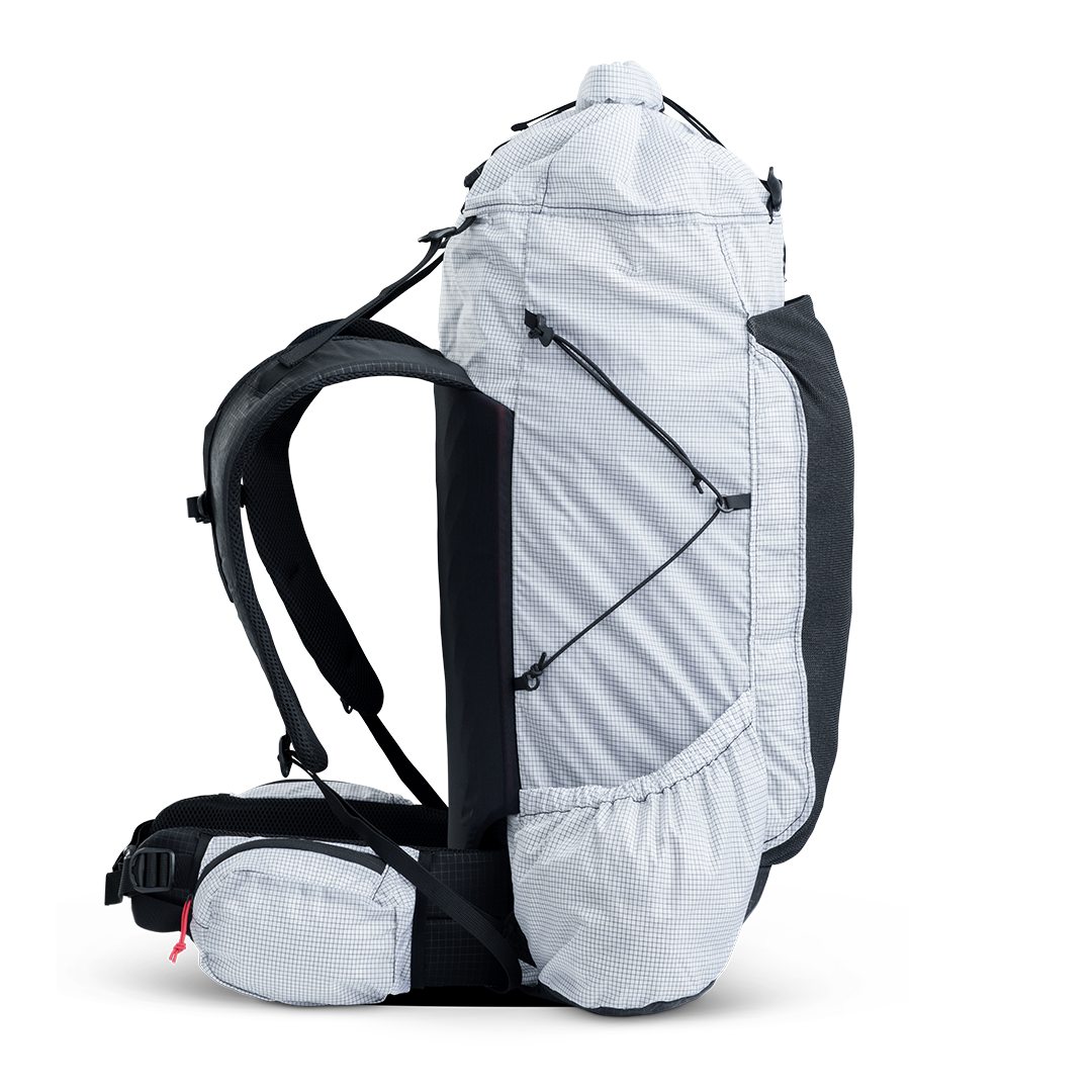 Left side view of ultralight backpack showing compression cords and side storage pocket.