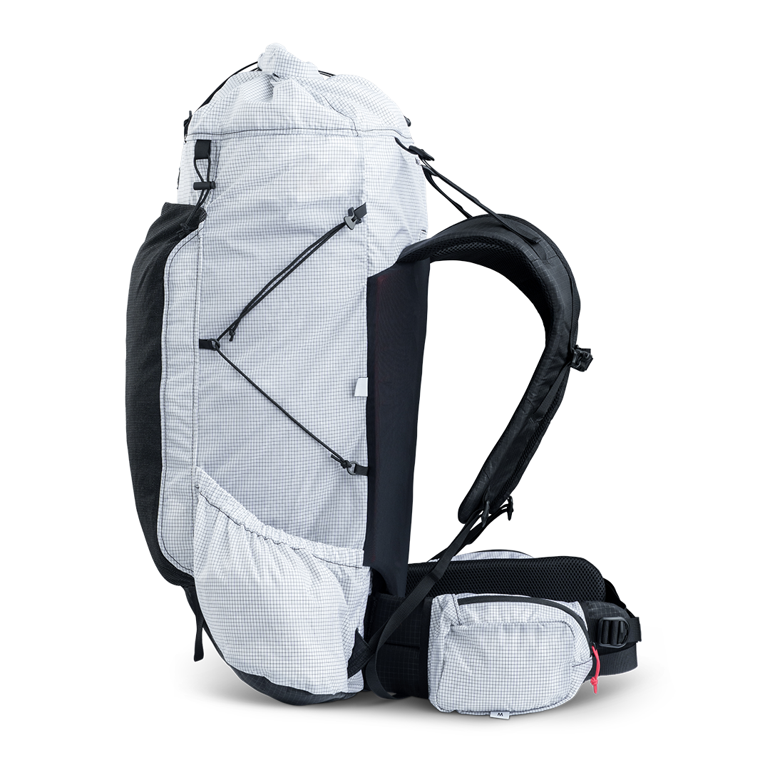 Right side view of ultralight backpack showing compression system and side pocket design.
