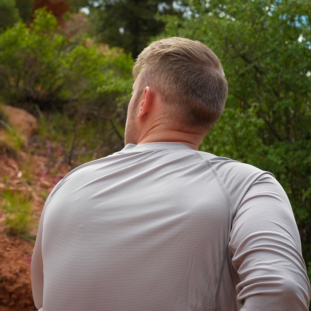 Man wearing long-sleeve athletic shirt