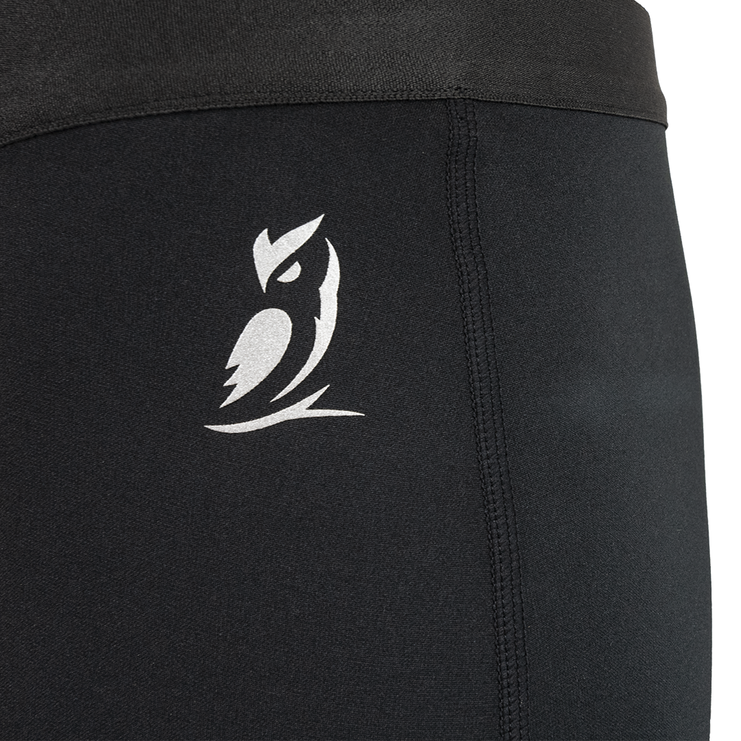 Close-up shot of Outdoor Vitals owl logo printed on Highline Thermal Leggings