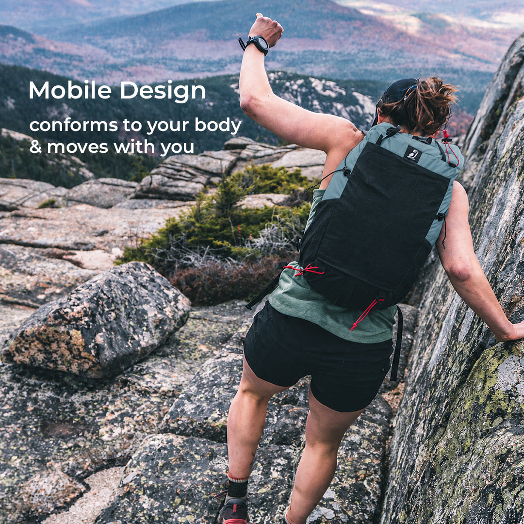 backpacker moves quickly down rocky mountain terrain. Text on screen says, "Mobile Design - conforms to your body & moves with you."