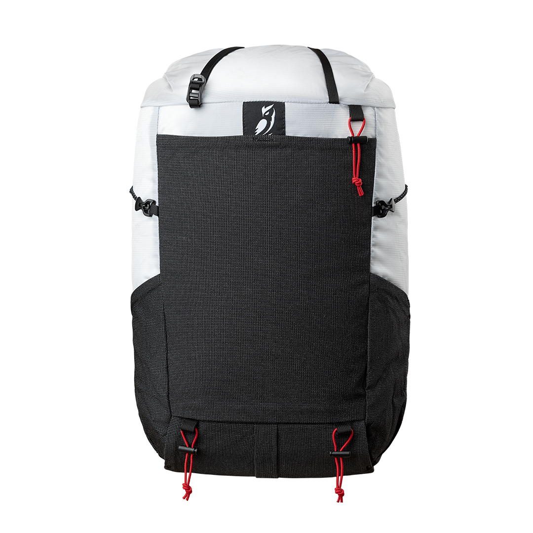 Front product view of the Outdoor Vitals Skyline 30 Fastpack displaying the large stretch-mesh pocket, side water bottle pockets, brand logo patch, top compression strap, and lower gear attachment loops.