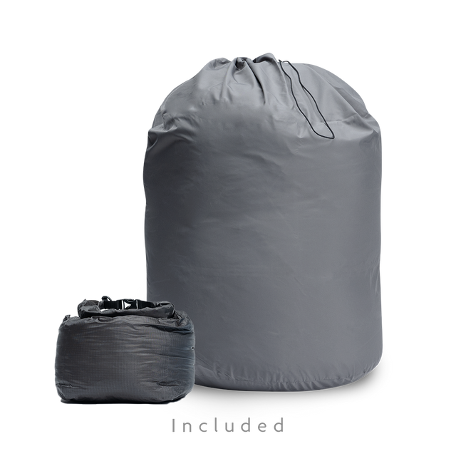 Two storage bags for a backpacking quilt: a large drawstring long-term storage sack and a smaller compressible stuff sack.