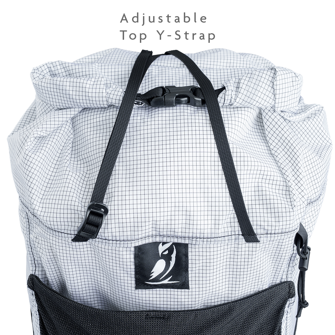 Top view of backpack showing adjustable Y-strap used to secure bulky gear.