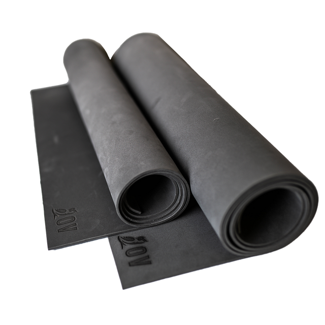 side view of 2 closed cell foam sleeping pads that are rolled up
