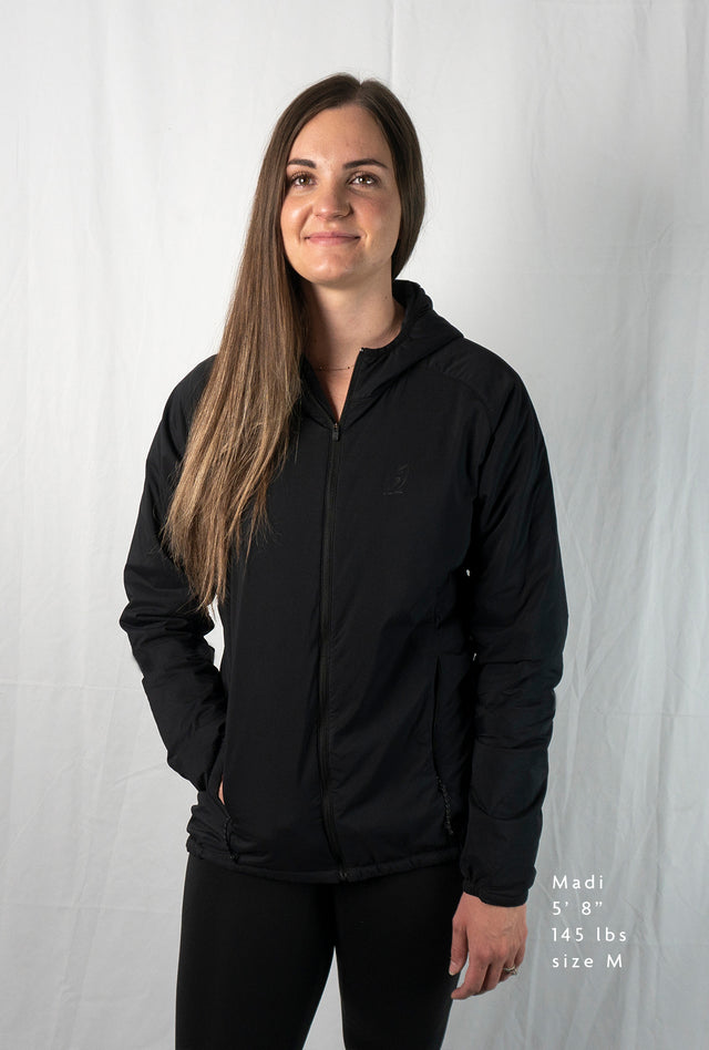 Woman wearing a full zip hooded jacket