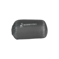 Compact stuff sack with ultralight down booties packed inside for backpacking