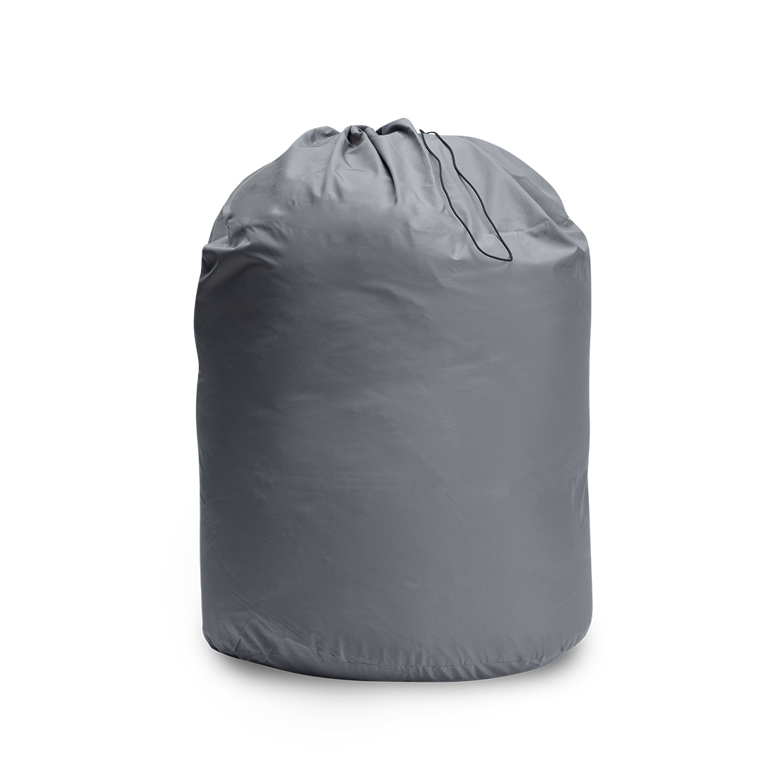 Outdoor Vitals StormLoft Down TopQuilt uncompressed and stored inside its breathable fabric storage sack with a cinch drawstring closure.