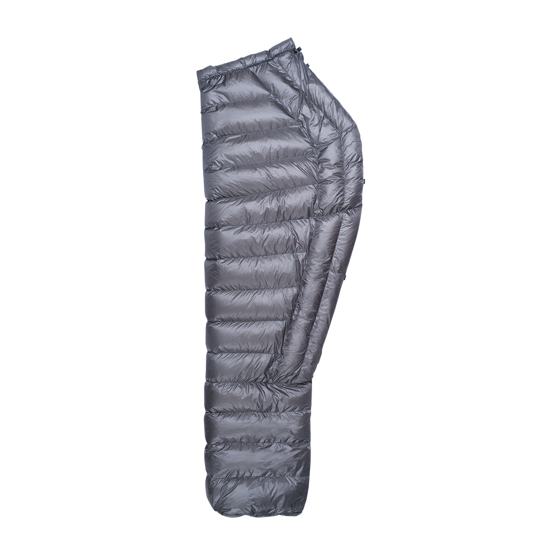 Side profile view of the Outdoor Vitals StormLoft Down TopQuilt showing its contoured shape, baffled design, and enclosed footbox.