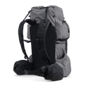 Side and rear angled view of the Shadowlight 60 ultralight backpack in gray, showing shoulder straps, hip belt, and large storage pockets.