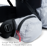 Close-up of large hip belt pocket on backpack designed for one-handed access.