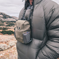 bino harness shown in use with Resolve Down Anorak.