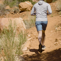 rear view of men's shorts on trail runner