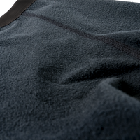 Close-up shot showing the soft fleece interior texture, elastic waistband, and flatlock seam stitching of Outdoor Vitals Highline Thermal Leggings.
