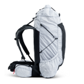 Left side view of ultralight backpack showing compression cords and side storage pocket.