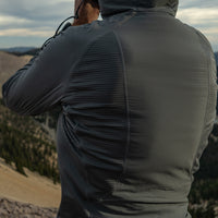 close rear view of hybrid fleece hoodie on man 