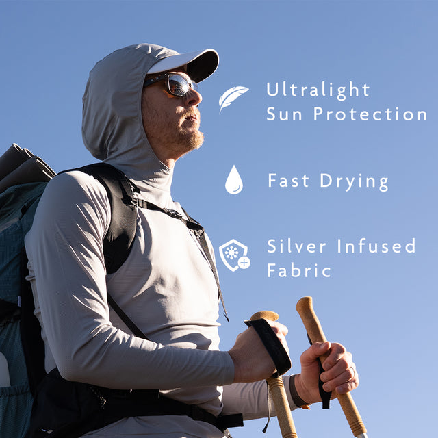 Gray - hiker wearing gray sun hoodie in the sunlight