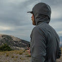 close side view of fleece hoodie on a man with the hood up