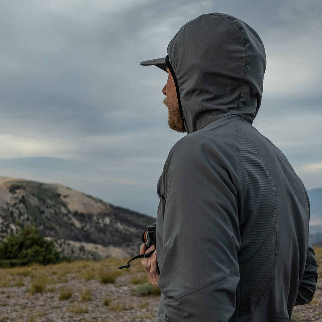 close side view of fleece hoodie on a man with the hood up