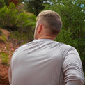 Man wearing long-sleeve athletic shirt