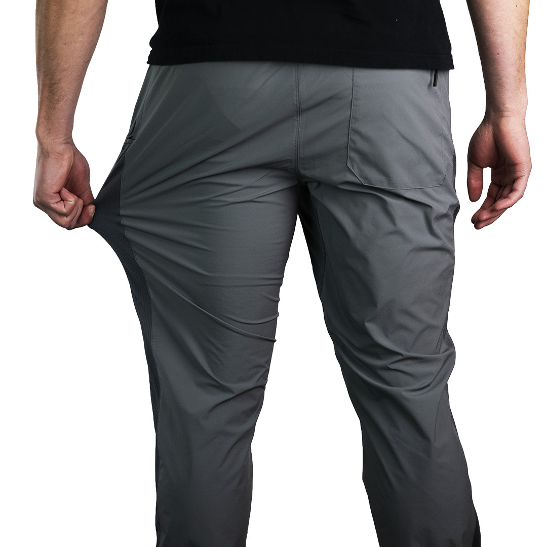 rear view of men's Skyline Trial Joggers being stretched