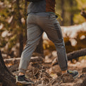side view of man wearing men's Skyline Joggers in the woods