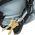 Close-up of the Shadowlight Ultralight Backpack's hip belt pocket with attached key clip