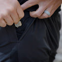close view of key/card sleeve inside pocket of men's trail shorts for running and hiking