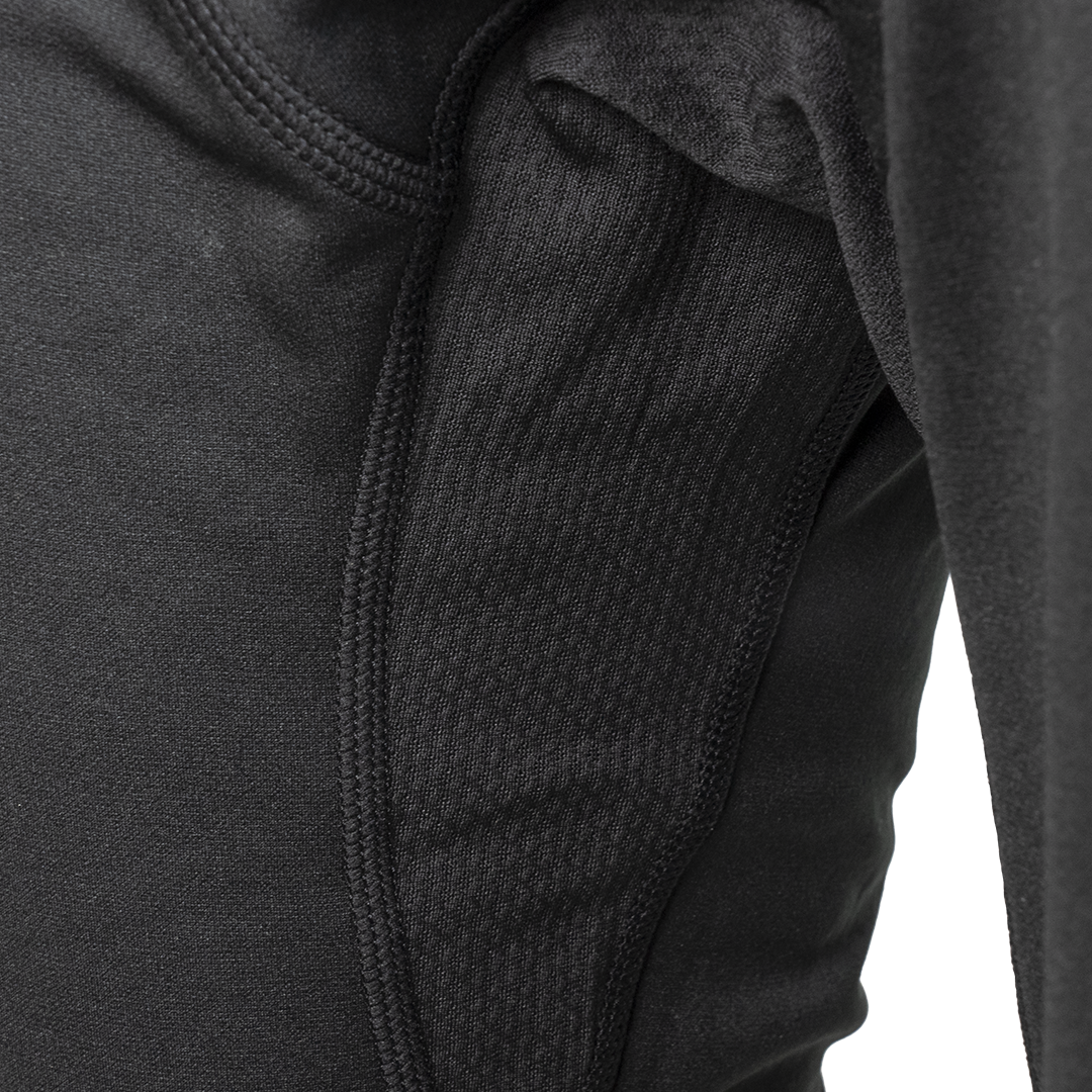 Extreme close-up of the breathable mesh inseam gusset and flatlock stitching on Outdoor Vitals Highline Thermal Leggings.