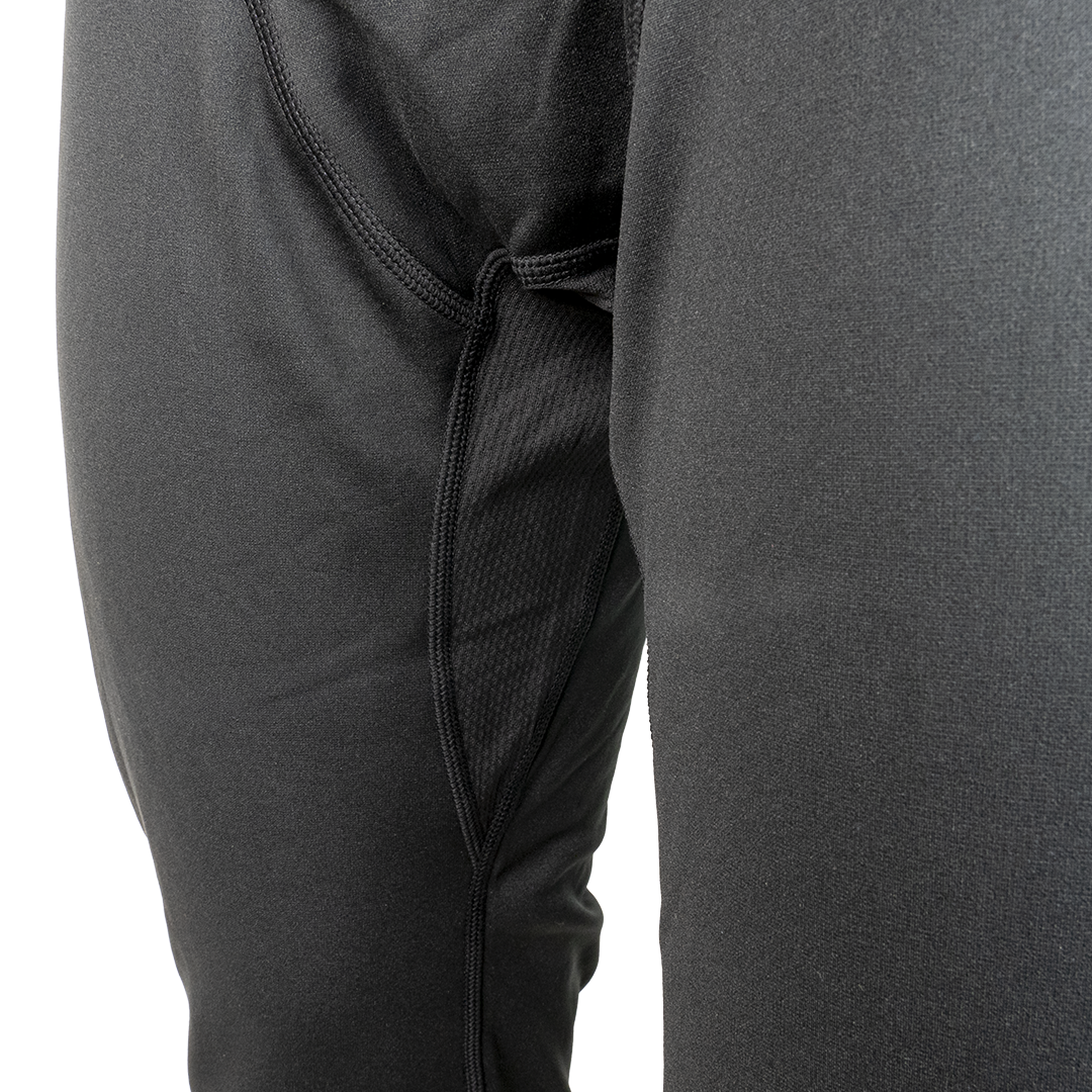 Front detail view of Outdoor Vitals Highline Thermal Leggings showing the contoured crotch construction, inseam stitching, and breathable mesh ventilation panel.