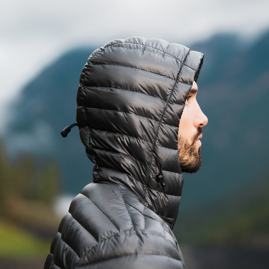 Profile view of the adjustable, insulated hood on a NovaUL ultralight down jacket.