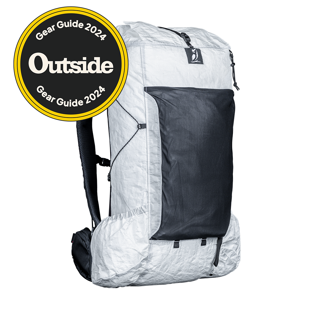 Angled view of CS40 backpack with a visible brand logo on a plain background with an Outside Gear Guide award badge.