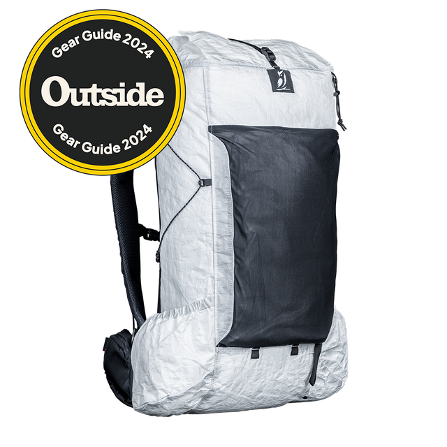 Angled view of CS40 backpack with a visible brand logo on a plain background with an Outside Gear Guide award badge.