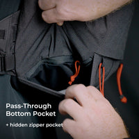 Close-up view of the bottom stretch mesh pocket on the Outdoor Vitals Skyline 30 Fastpack.