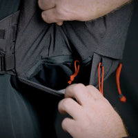 Close-up view of the bottom stretch mesh pocket on the Outdoor Vitals Skyline 30 Fastpack.