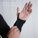 close view of thumb loops on fleece hoodie to help with layering