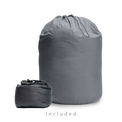 Two storage bags for a backpacking quilt: a large drawstring long-term storage sack and a smaller compressible stuff sack.