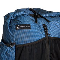 Close-up of the roll top & label on top of the Shadowlight Ultralight Backpack
