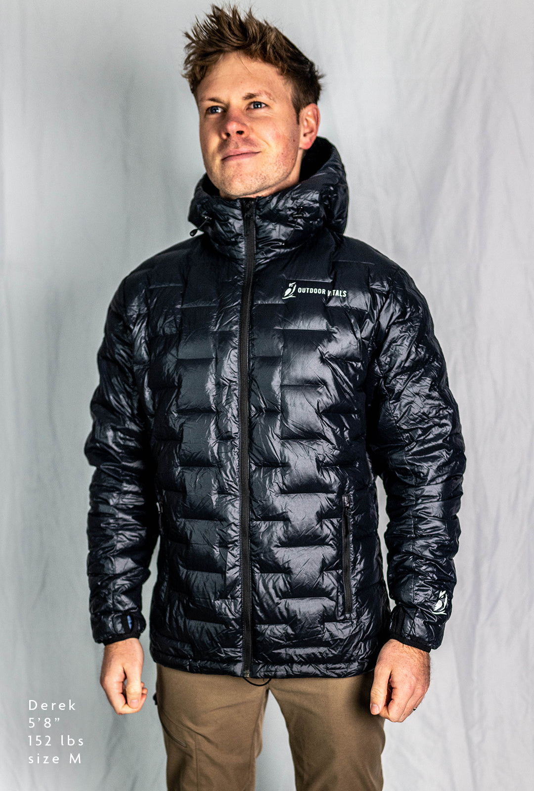Fit-reference studio shot of a model wearing a NovaPro Jacket in a size medium.