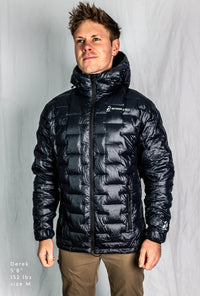 Fit-reference studio shot of a model wearing a NovaPro Jacket in a size medium.