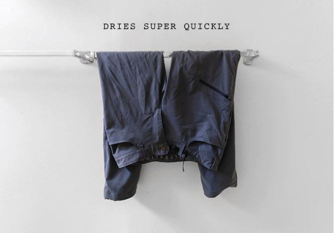 Outdoor Vitals Satu Adventure Pants hanging to dry on a rack.
