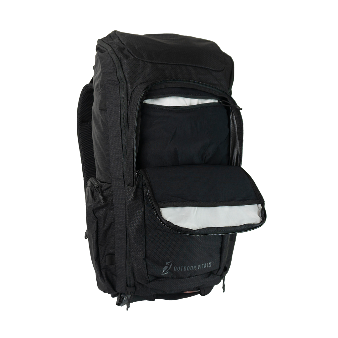 Three-quarter front view of the Outdoor Vitals KotaUL Ultralight Travel & Adventure Backpack with the front compartment unzipped to reveal internal storage pockets and white fabric lining.