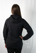 Woman wearing a full zipped hoodie jacket back view