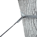 Close-up of an Outdoor Vitals tree saver strap wrapped around a tree trunk and attached to a Whoopie Sling suspension line.