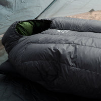 side view of ultralight down sleeping bag inside tent
